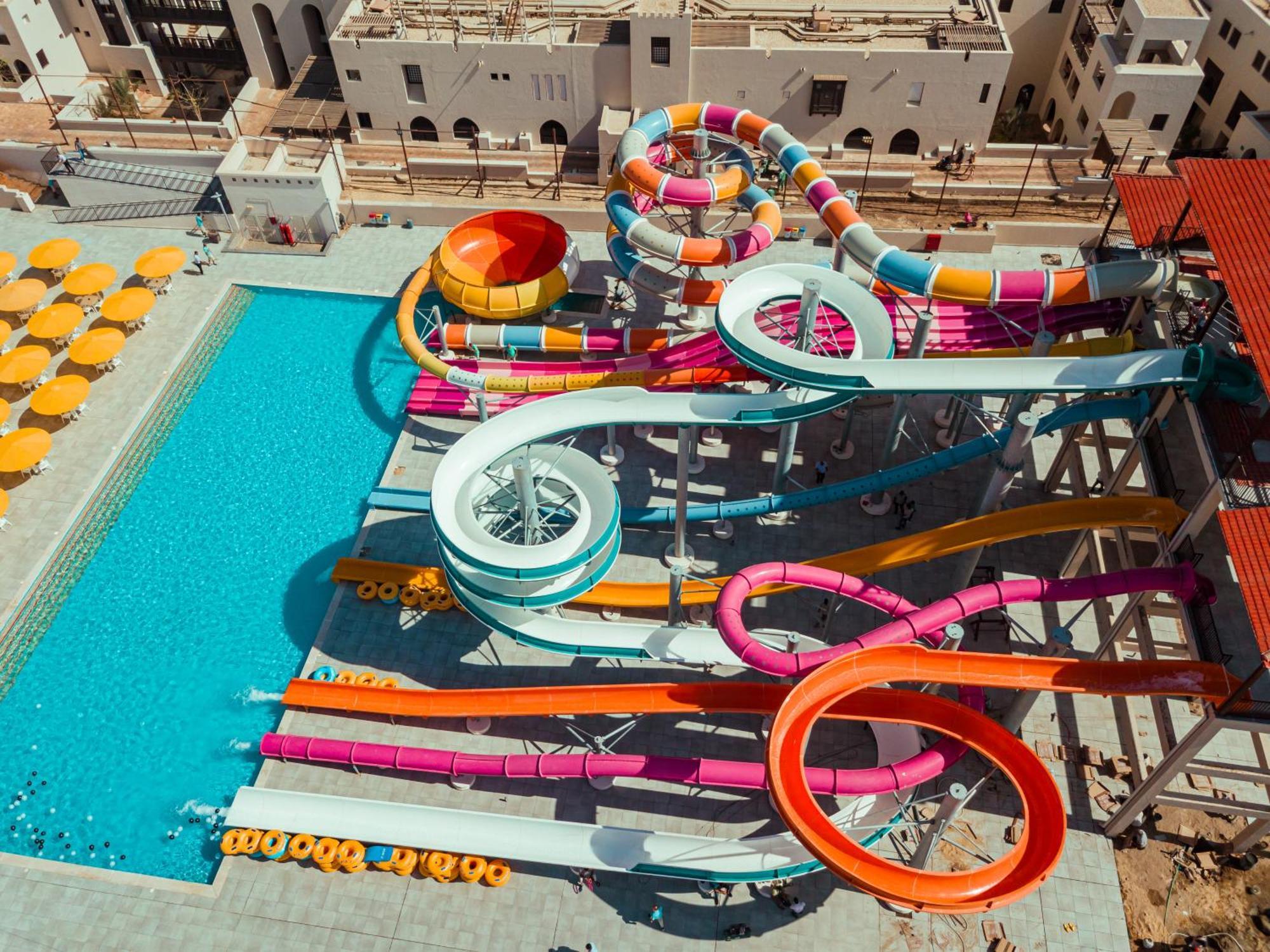 Pickalbatros Oasis Port Ghalib Hotel Exterior photo Aerial view of the water park